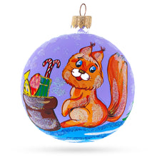 Load image into Gallery viewer, Squirrel Presenting Gifts Beside a Festive Tree Glass Ball Christmas Ornament 3.25 Inches