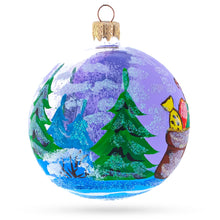 Load image into Gallery viewer, Squirrel Presenting Gifts Beside a Festive Tree Glass Ball Christmas Ornament 3.25 Inches