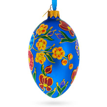 Load image into Gallery viewer, Colorful Flowers on Blue Glass Egg Ornament 4 Inches