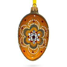 Load image into Gallery viewer, White Flower On Orange Glass Egg Ornament 4 Inches
