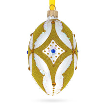 Load image into Gallery viewer, Golden Rhombus On White Glass Egg Ornament 4 Inches
