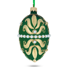 Load image into Gallery viewer, Beaded Center &amp; Golden Flowers On Green Glass Egg Ornament 4 Inches