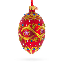 Load image into Gallery viewer, Blue Jewels On Red Glass Egg Ornament 4 Inches
