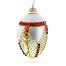 Load image into Gallery viewer, Red Jewels Eccentrics on White Glass Egg Ornament 4 Inches