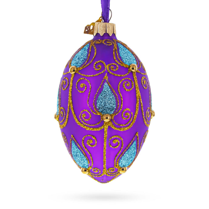 Blue Leaf on Purple Glass Egg Ornament 4 Inches