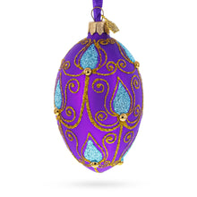 Load image into Gallery viewer, Blue Leaf on Purple Glass Egg Ornament 4 Inches