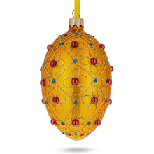 Load image into Gallery viewer, Red Beads, Blue Crystals &amp; Filigree Trellis Glitter on Gold Glass Egg Ornament 4 Inches