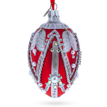 Load image into Gallery viewer, Silver Ropes on Red Glass Egg Christmas Ornament 4 Inches