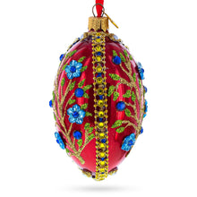Load image into Gallery viewer, Blue Bejeweled Flowers on Red Glass Egg Ornament 4 Inches