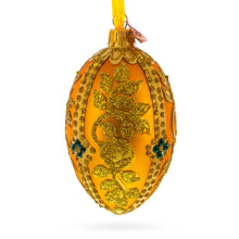 Load image into Gallery viewer, Glittered Golden Leaves Orange Glass Egg Ornament 4 Inches