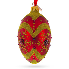 Load image into Gallery viewer, Golden Snowflake on Red Glass Egg Ornament 4 Inches