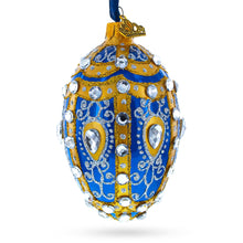 Load image into Gallery viewer, White Scrolls on Blue Glass Egg Ornament 4 Inches