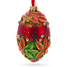 Load image into Gallery viewer, Red and Green Leaves on Red Glass Egg Ornament 4 Inches