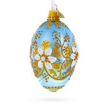 Load image into Gallery viewer, Blue and Gold Embossed Floral Glass Egg Ornament 4 Inches