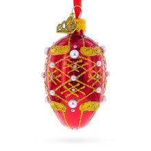 Load image into Gallery viewer, Red with Gold Glitter, Pearl Accents, and Floral Design Mini Glass Egg Ornament 2.9 Inches