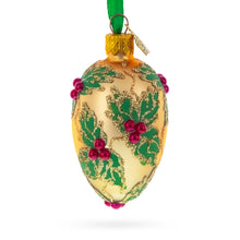 Load image into Gallery viewer, Golden with Holly Leaf and Red Berry Accents Mini Glass Egg Ornament 2.9 Inches