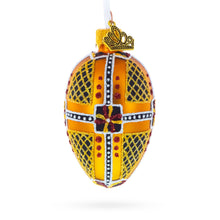 Load image into Gallery viewer, Amber with Red, Black, and Gold Geometric Pattern Mini Glass Egg Ornament 2.9 Inches