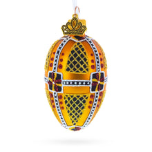 Load image into Gallery viewer, Amber with Red, Black, and Gold Geometric Pattern Mini Glass Egg Ornament 2.9 Inches