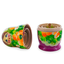 Load image into Gallery viewer, Green Hood with Purple and White Flowers Wooden  Nesting Dolls