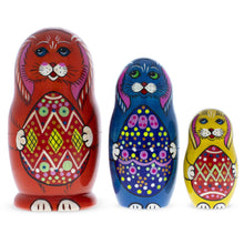 Load image into Gallery viewer, Set of 3 Bunnies with Easter Eggs Nesting Dolls
