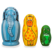 Load image into Gallery viewer, Set of 3 Elephant, Giraffe, and Alligator Wooden Nesting Dolls 4.25 Inches