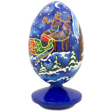 Load image into Gallery viewer, Santa Claus, Bunny Reindeer Looking at the Christmas Tree Wooden Egg 4.75 Inch