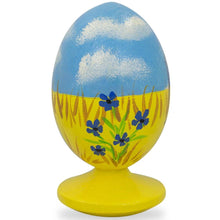 Load image into Gallery viewer, Ukrainian Girl with Flag Easter Egg Figurine