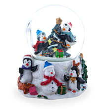Load image into Gallery viewer, Penguins' Festive Tree Celebration Snow Water Globe