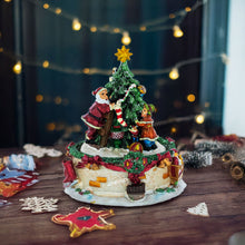Load image into Gallery viewer, Tree Decorating Duo Spinning Musical Christmas Figurine